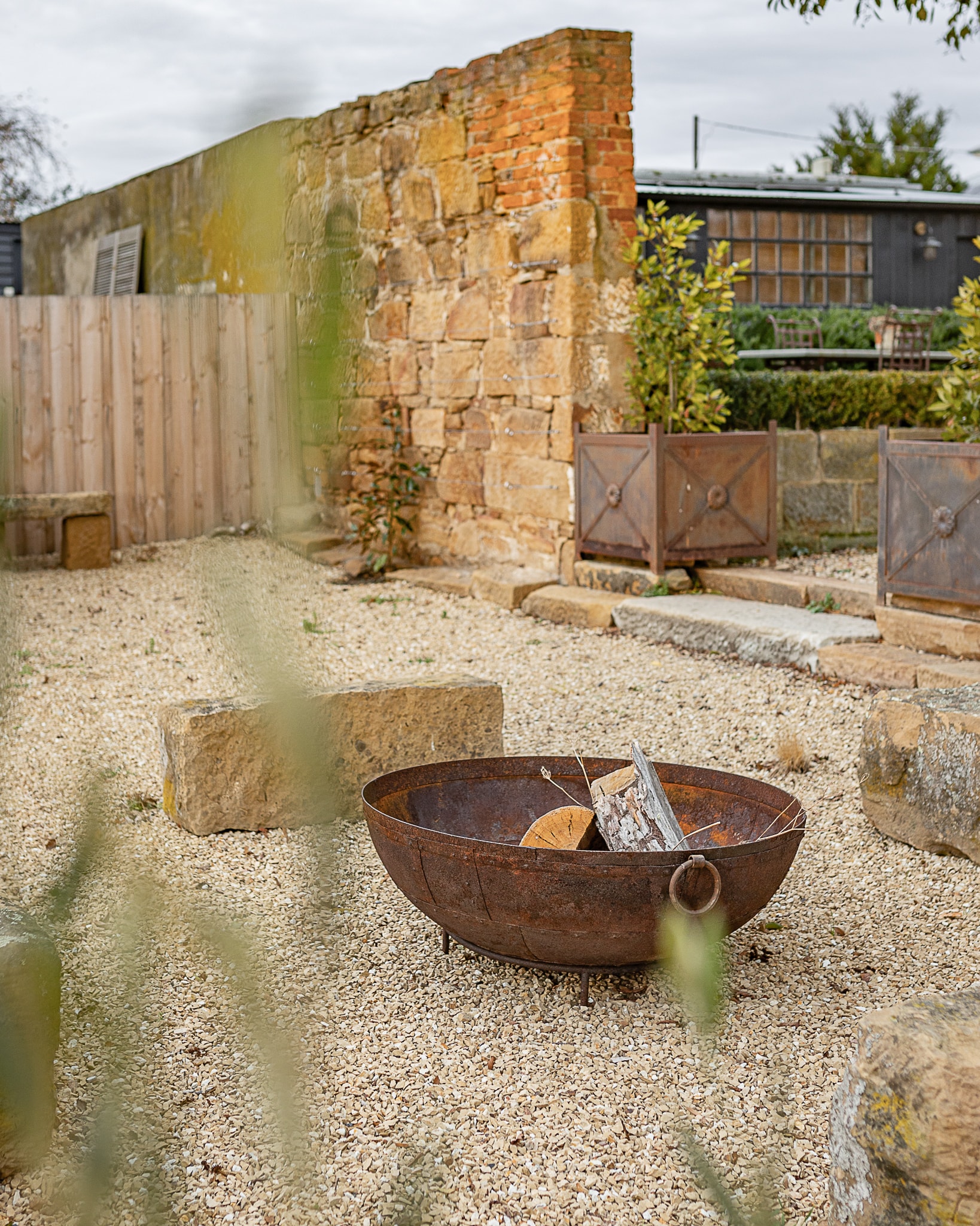 Raffah House outdoor seating area and fire pit